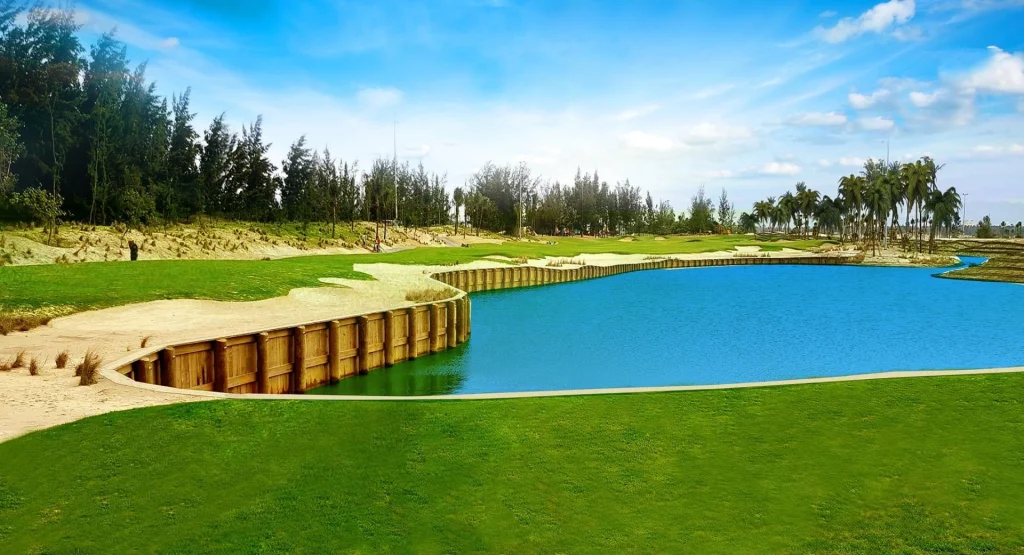 BRG Da Nang Nicklaus Course green with water hazard and bunker Vietnam