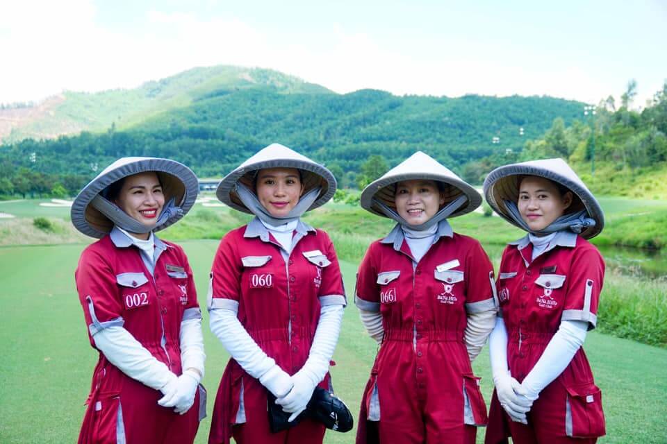 Female golf caddies in Vietnam – friendly, well-trained, and professional serviceTitle: Vietnam Golf Caddies – Professional & Friendly