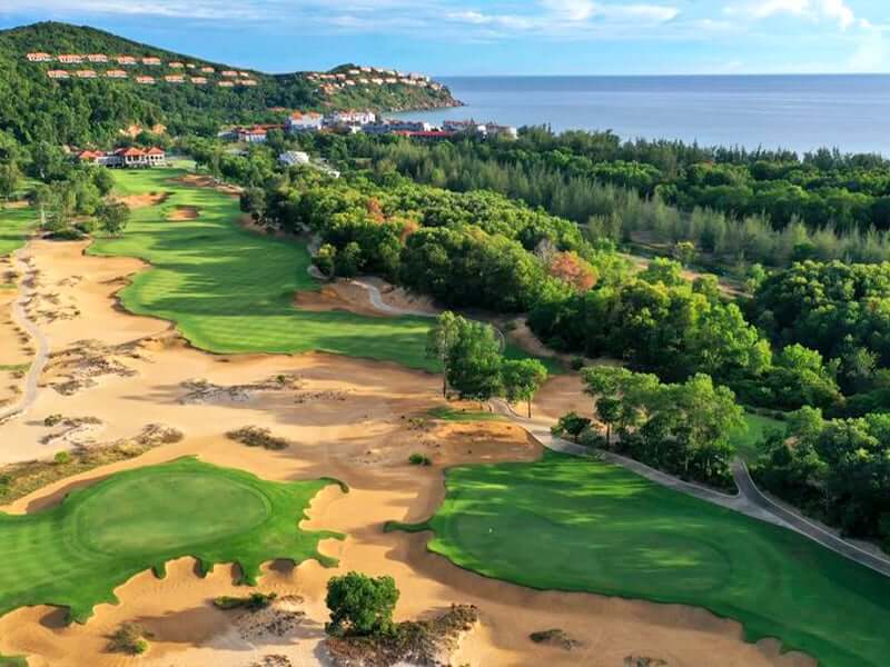 Laguna Lang Co Golf Club fairway with mountain and sea views in Central Vietnam designed by Nick Faldo