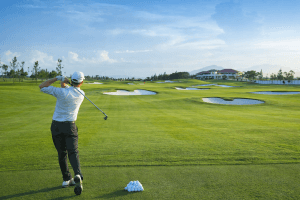 golfer playing on Vietnam golf course safe travel destination clean professional golf environment
