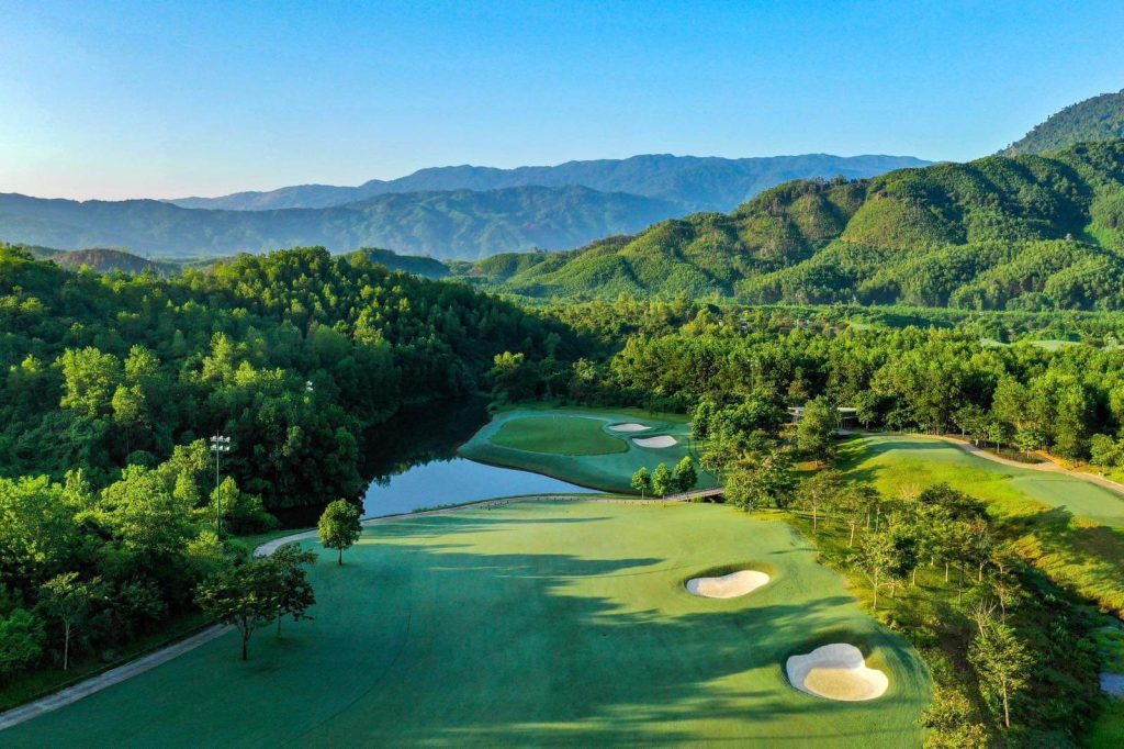 Ba Na Hills Golf Club fairway view with bunkers and mountains in Da Nang Vietnam