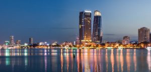 Novotel Da Nang hotel overview with Han River skyline at night