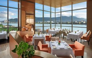 Restaurant at Novotel Da Nang with panoramic sea view dining area