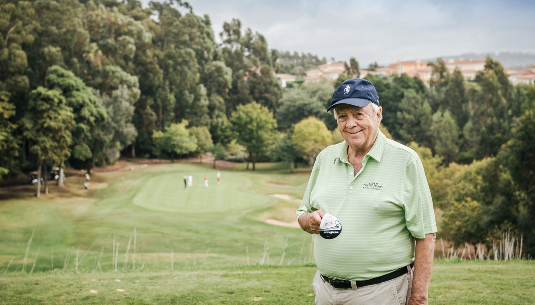 Robert Trent Jones Jr., designer of Hoiana Shores Golf Club, standing on a golf course