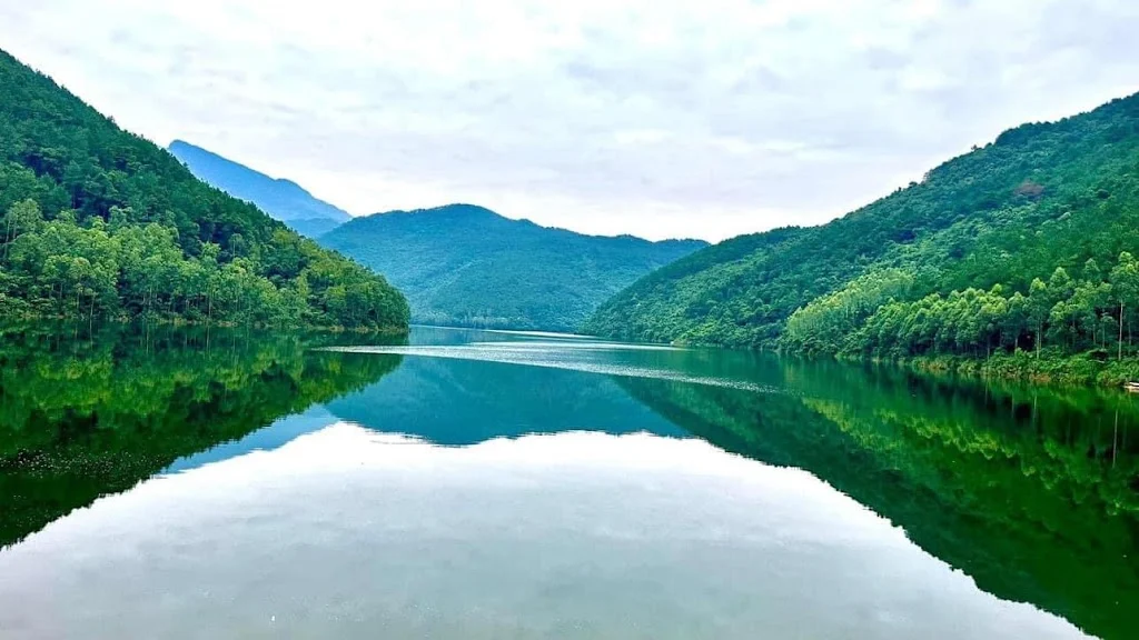 Lake and forested mountains in the Tam Dao range north of Hanoi, the setting for several Hanoi golf resorts
