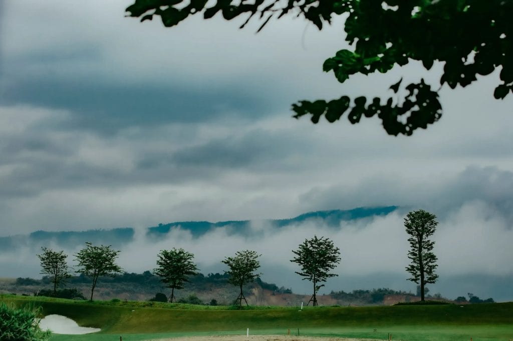 Sapa Grand Golf Course morning clouds over the Hoang Lien Son foothills