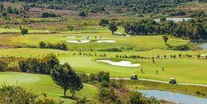 Aerial view of bunkered fairways at The Dalat at 1200 Country Club