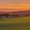Sunset over The Dalat at 1200 golf course and its lake