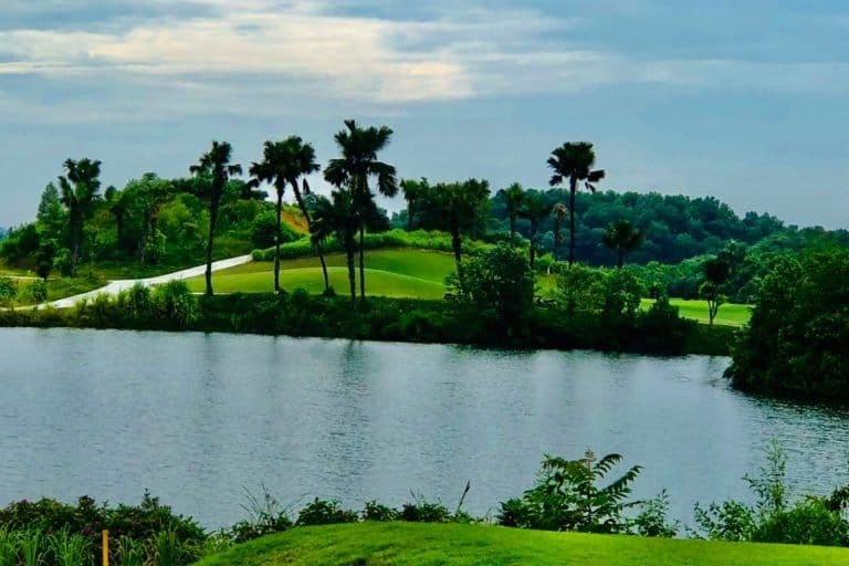 Green across the lake at Yen Bai Star Golf & Resort