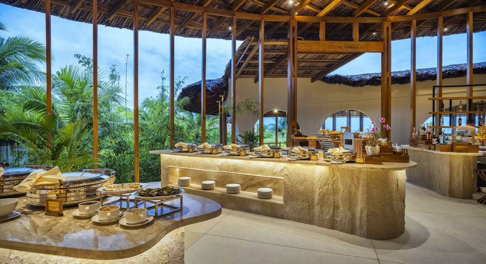 Open-sided restaurant with breakfast buffet at Ana Mandara Cam Ranh