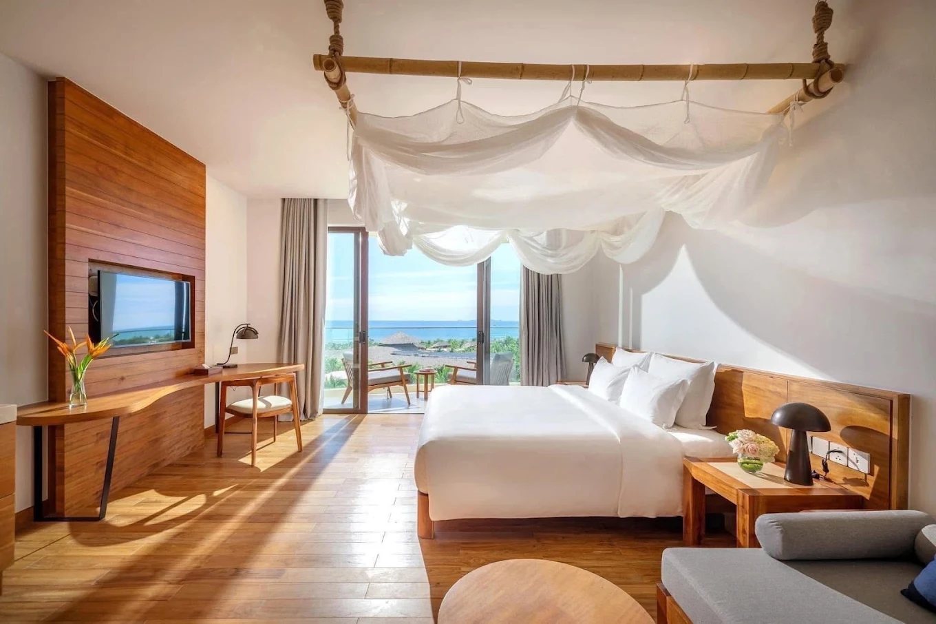 Sea view room with canopy bed at Ana Mandara Cam Ranh