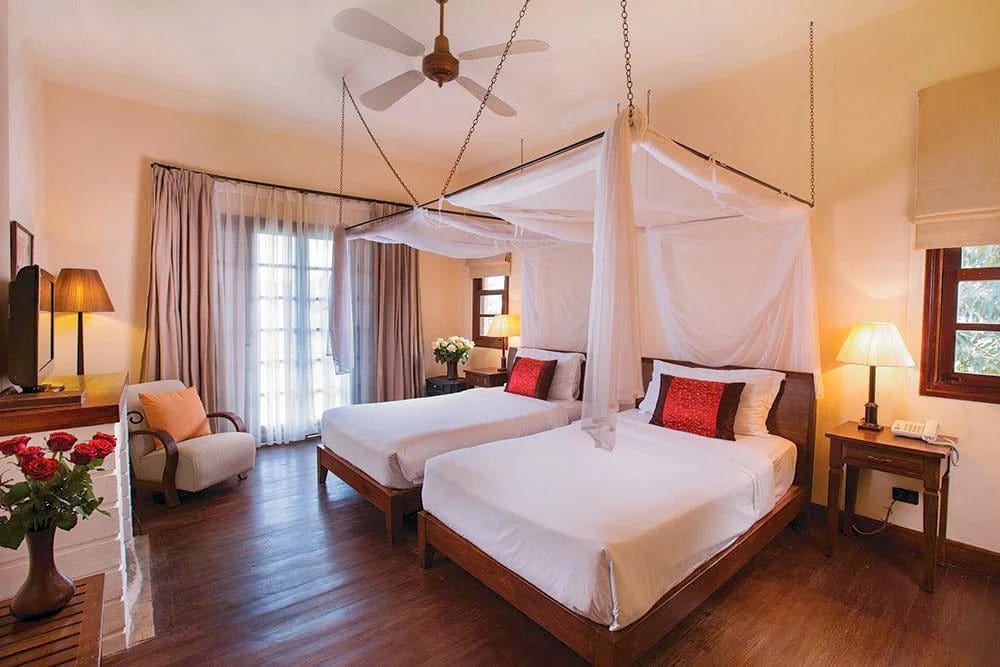 Twin villa room with wooden floor at Ana Mandara Villas Dalat Resort & Spa