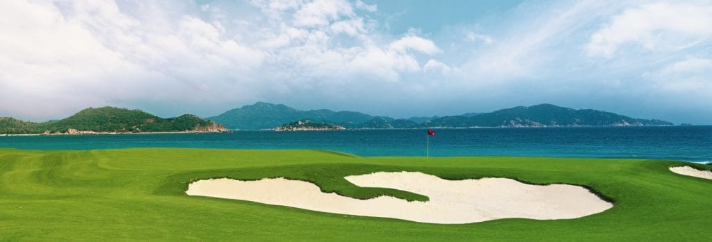Seaside green and bunkers at ANARA Binh Tien Golf Club