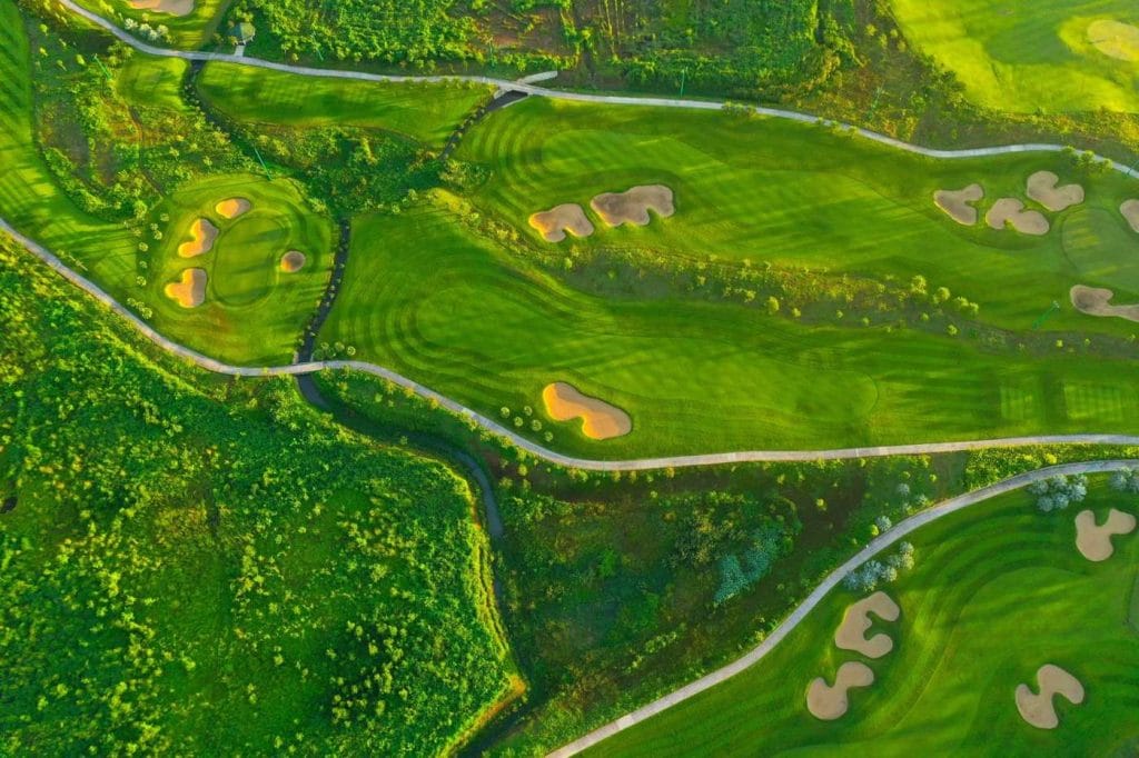 Aerial view of fairways and bunkers at Chau Duc Golf Course
