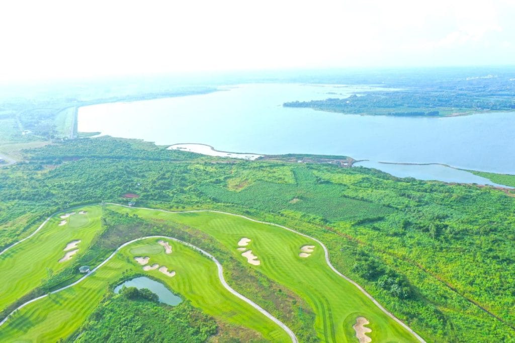 Hole 16 with lake view at Chau Duc Golf Course