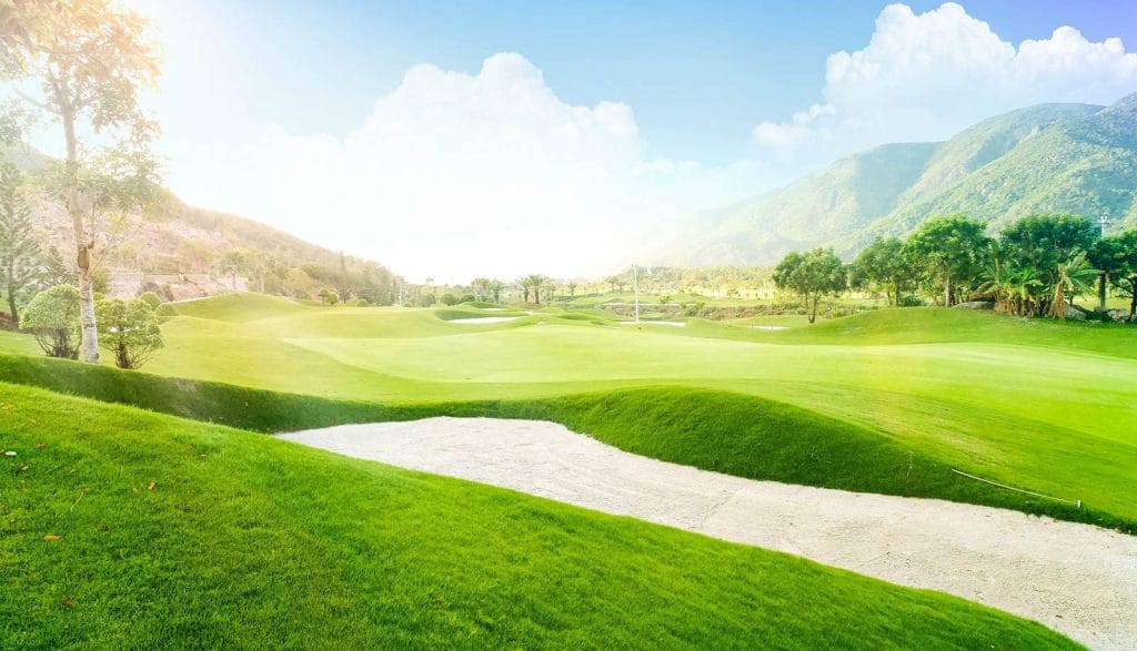 Fairway bunker and mountain backdrop at Diamond Bay Golf & Villas Nha Trang