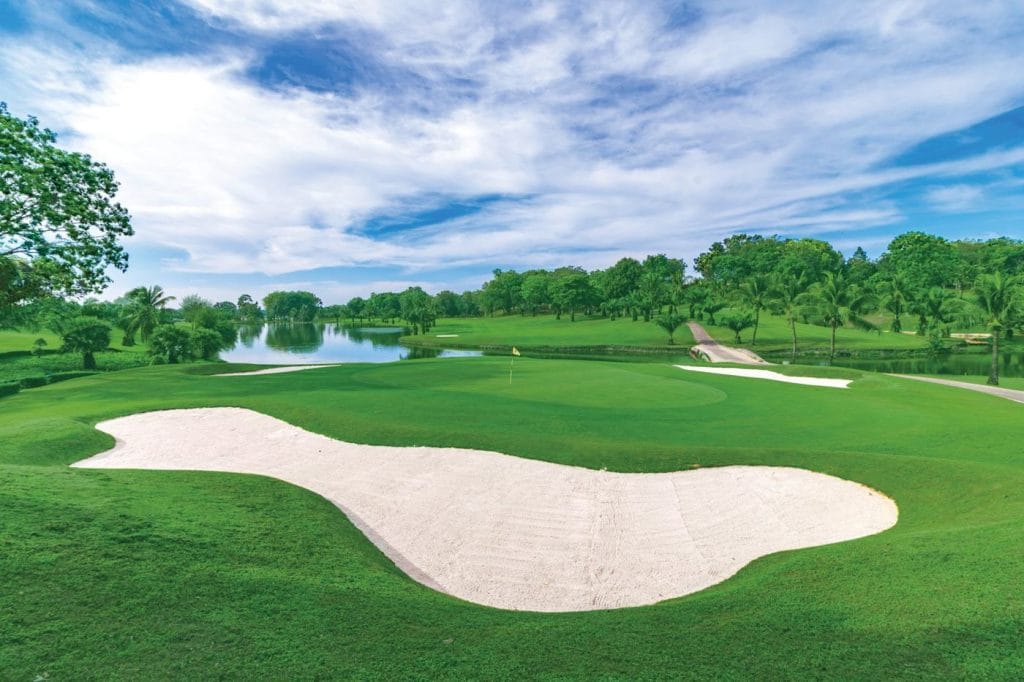 Greenside bunker beside the lake at Dong Nai Golf Resort