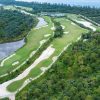 Fairways of Eschuri Vung Bau Golf Resort running toward the sea on Phu Quoc Island