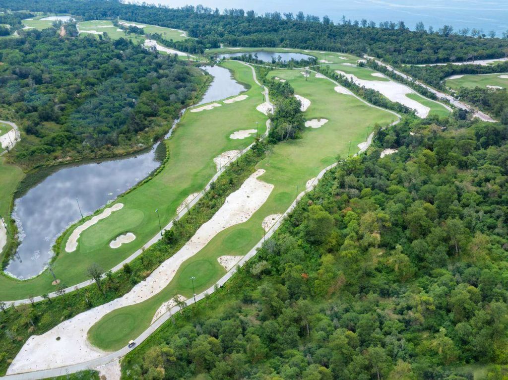 Fairways of Eschuri Vung Bau Golf Resort running toward the sea on Phu Quoc Island
