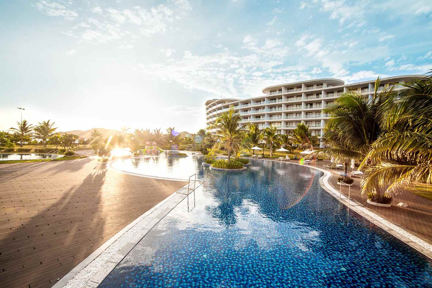 Outdoor pool at sunset at FLC Luxury Hotel Quy Nhon