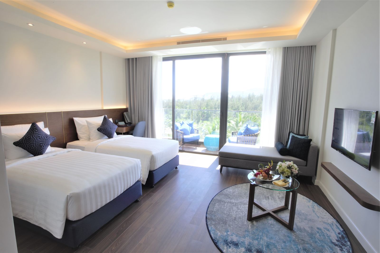 Studio suite with twin beds and balcony at FLC Luxury Hotel Quy Nhon