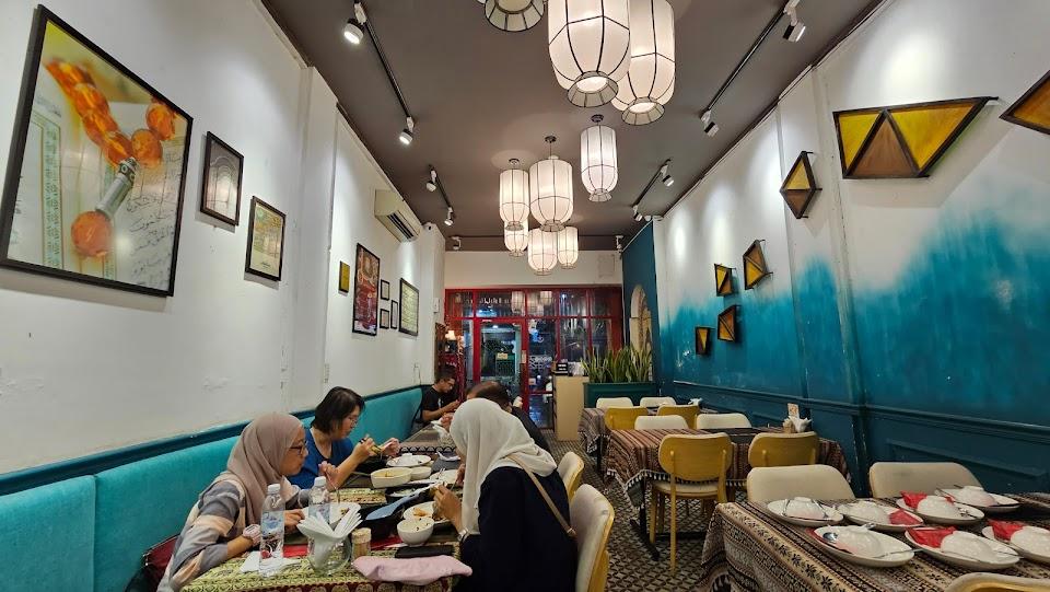 Muslim travellers having dinner at a halal-friendly restaurant in Da Nang, Vietnam