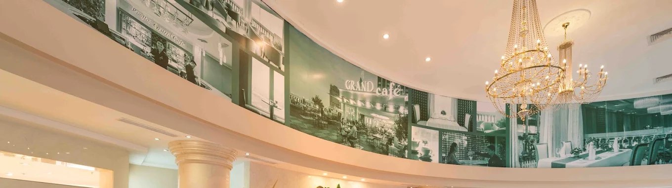 Lobby chandelier and mural at Hotel Grand Saigon