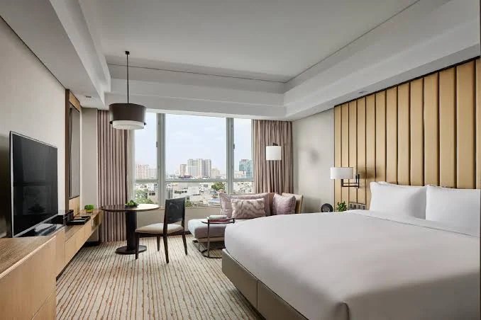Guest room with city view at New World Saigon Hotel
