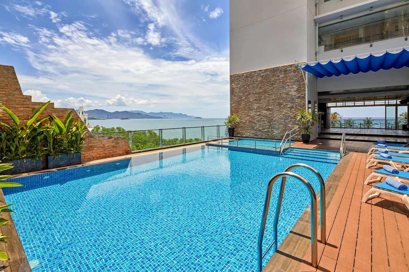 Outdoor pool overlooking Nha Trang Bay at Novotel Nha Trang
