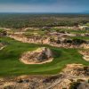 Aerial view of the links-style dunes course at The Bluffs Grand Ho Tram