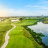 Fairway running beside a lake at Vinpearl Golf Leman