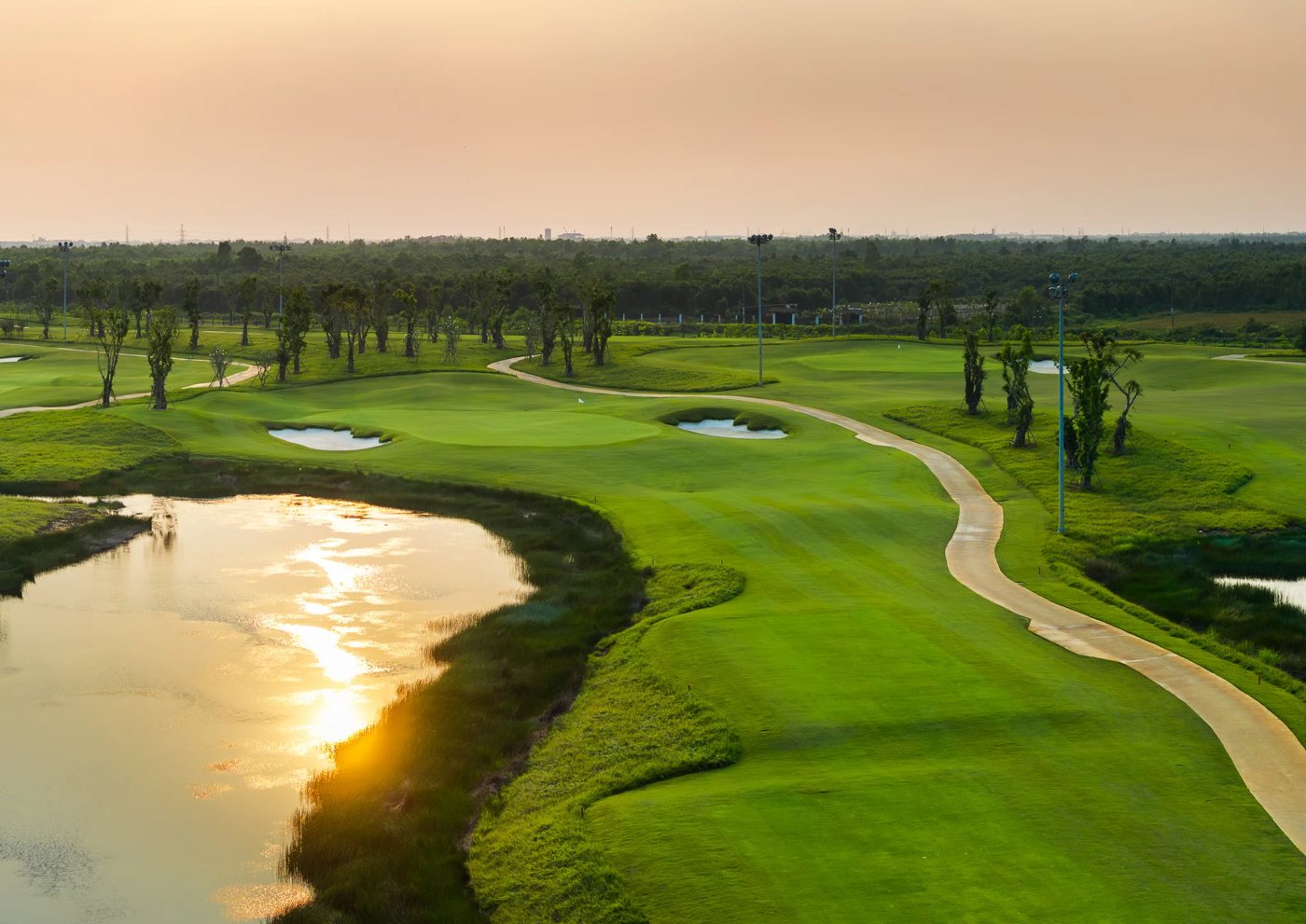 Hole 11 at sunset at Vinpearl Golf Leman