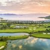 Aerial view of Vinpearl Golf Nha Trang with Nha Trang Bay behind