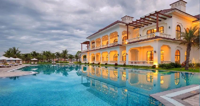 Villa and pool at dusk at Vinpearl Resort & Spa Phu Quoc